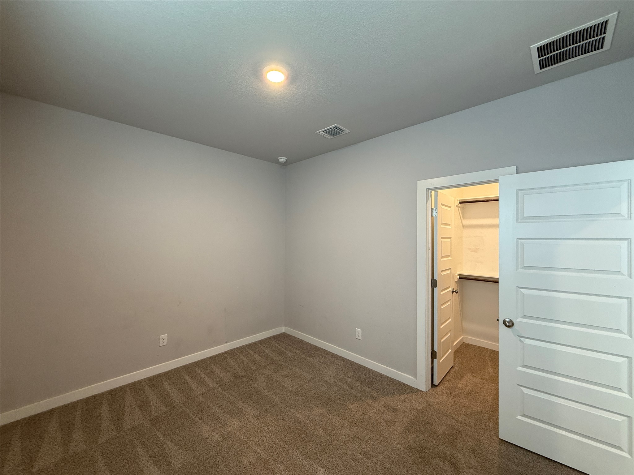 18300 Emu Lane Manor, TX 78653 - Photo 23 of 35 a view of an empty room and a window
