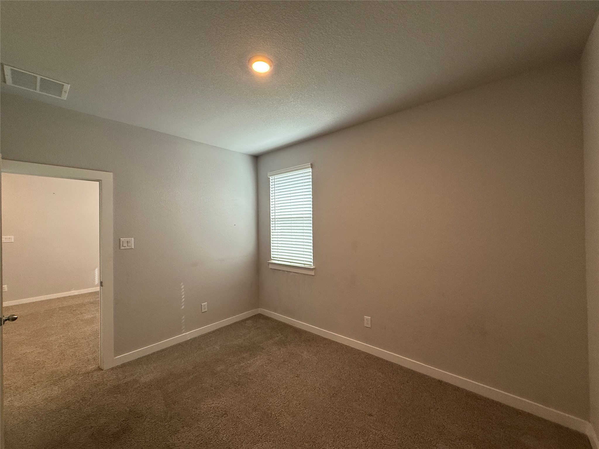 18300 Emu Lane Manor, TX 78653 - Photo 26 of 35 an empty room with a window