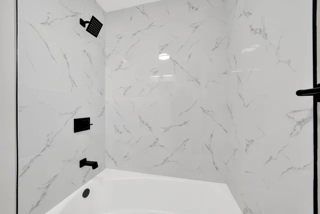 a bathroom with a bathtub