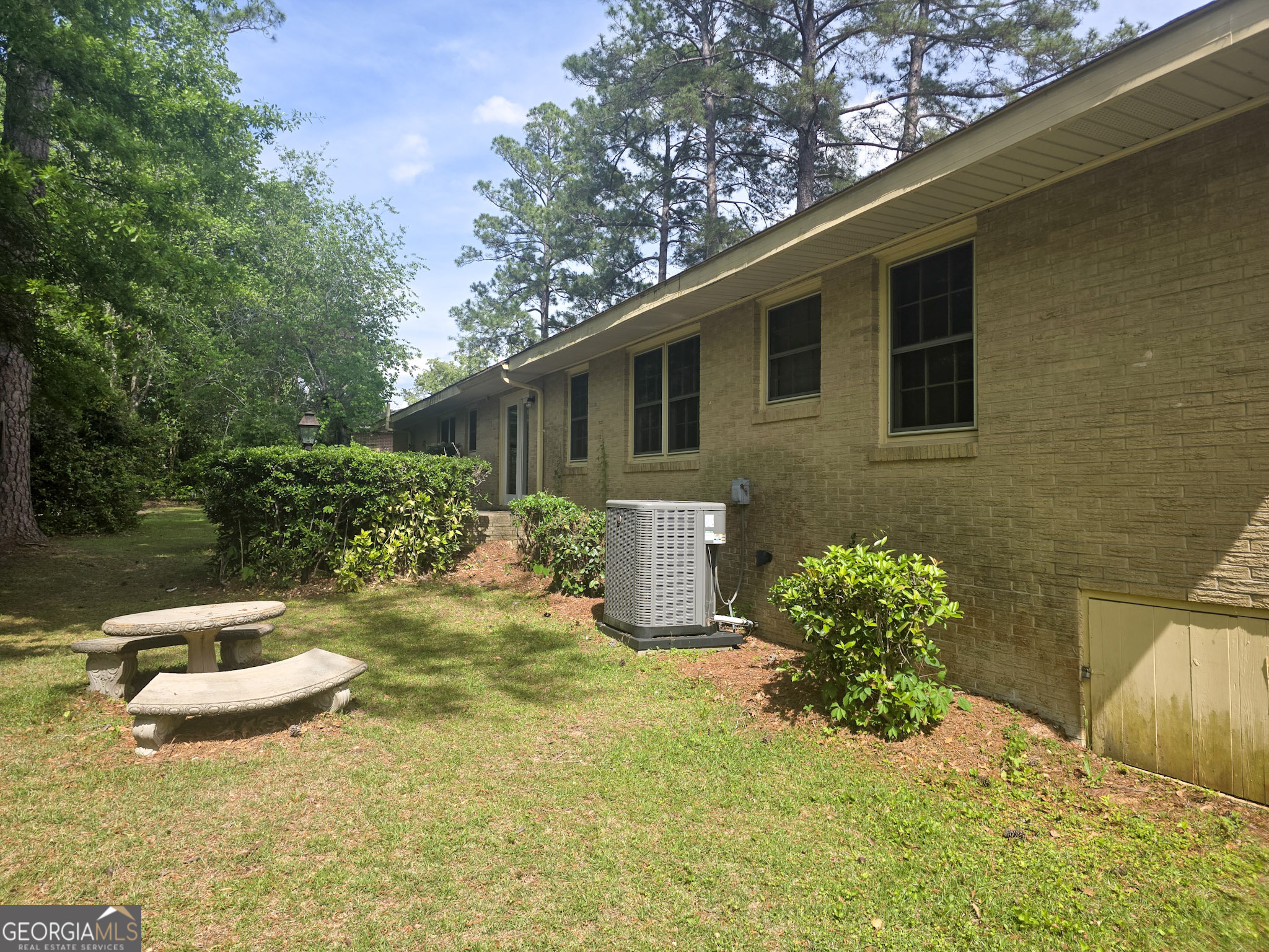 1712 Briarcliff Road Milledgeville, GA 31061 - Photo 35 of 38 a view of a backyard with plants and tree