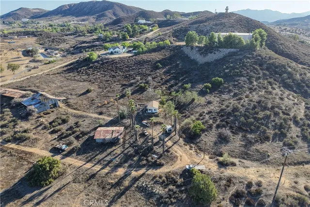 a view of a town with mountains in the background