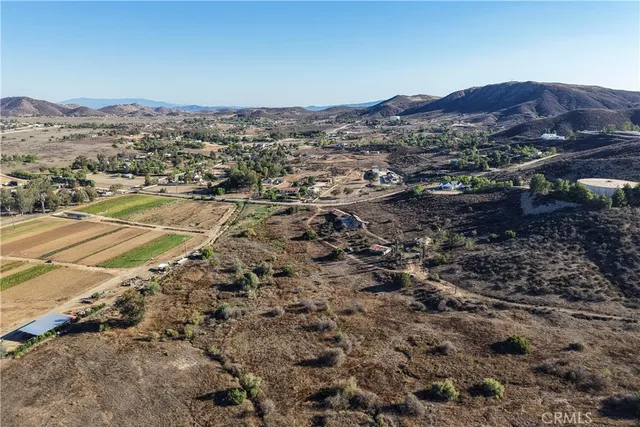a view of a city with mountains in the background