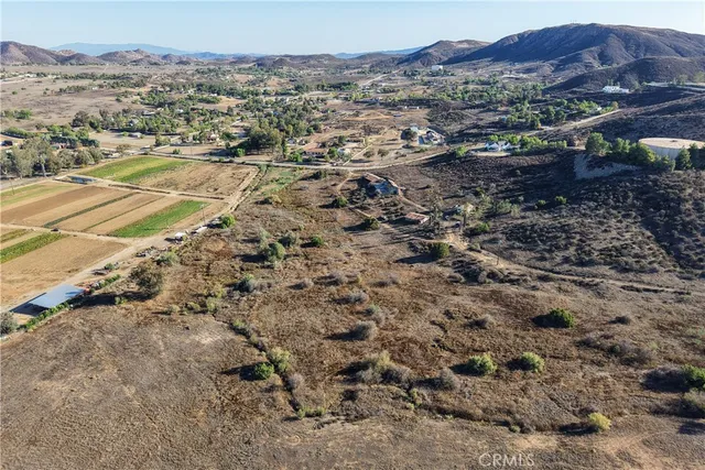 a view of a large house with a mountain