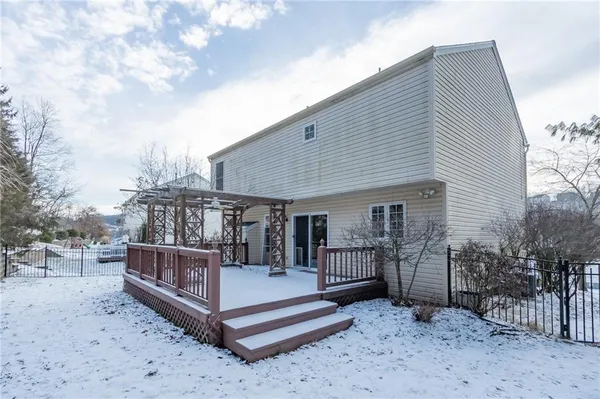 a view of wooden roof deck
