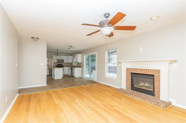 a bedroom with a bed and a fireplace