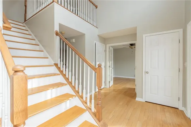 a view of a hallway with staircase