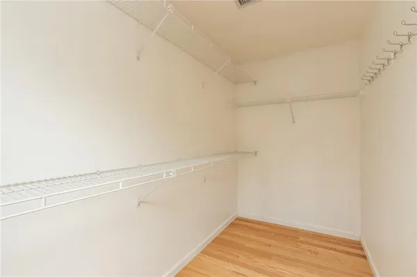 a view of a room with racks on the wall