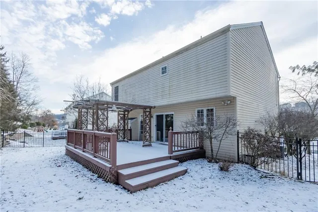 a view of wooden roof deck