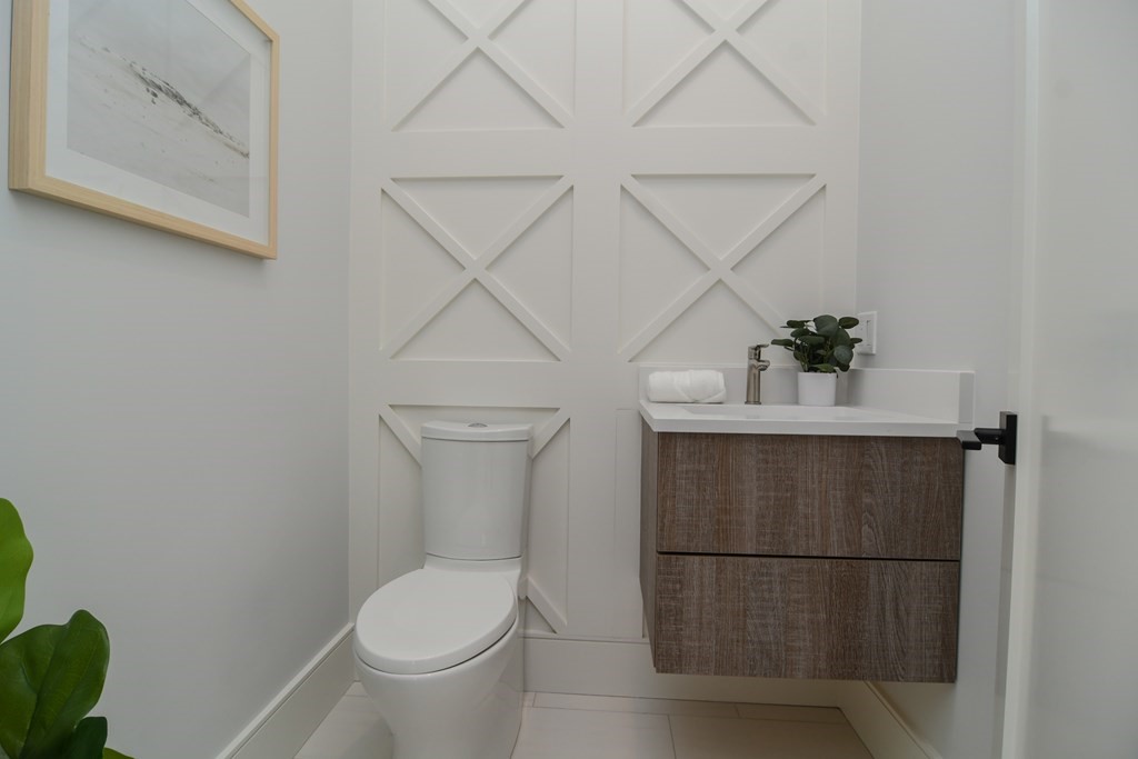 33 Cragmore Road Newton, MA 02464 - Photo 3 of 6 a bathroom with a toilet and a sink