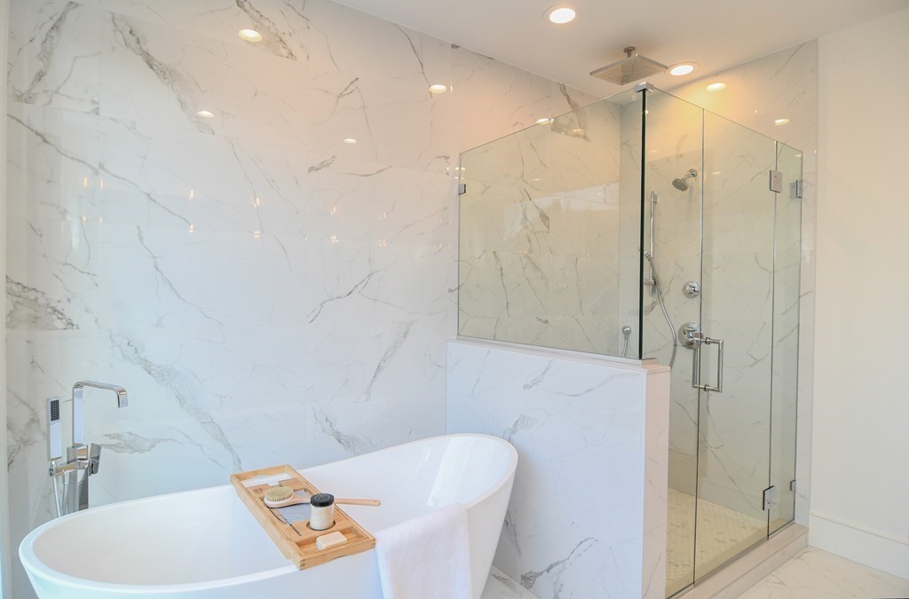 33 Cragmore Road Newton, MA 02464 - Photo 6 of 6 a bathroom with a sink toilet and shower