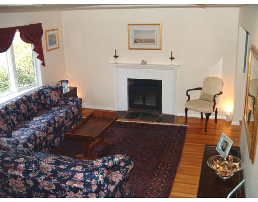 19 Linden Road Sudbury, MA 01776 - Photo 4 of 14 a living room with furniture and a fireplace
