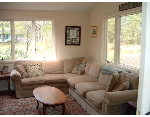 19 Linden Road Sudbury, MA 01776 - Photo 10 of 14 a living room with furniture and a large window