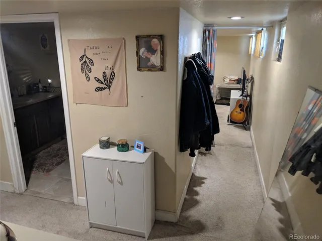 a bathroom with a sink and mirror