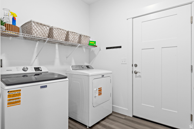 4735 Alder Drive, Unit F101 Mapleton, UT 84664 - Photo 22 of 30 Laundry area with washer and dryer and dark wood-type flooring