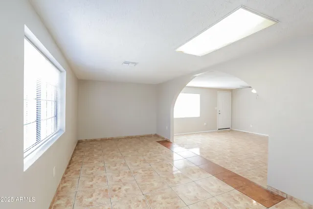 a view of a window in an empty room