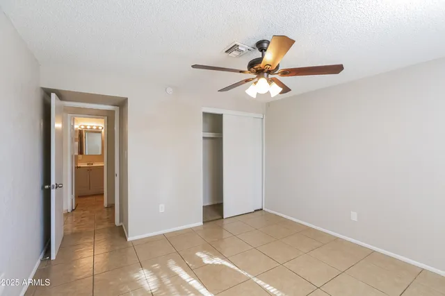 a view of a chandelier fan in a room
