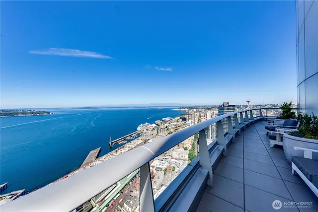 a view of a balcony with an ocean