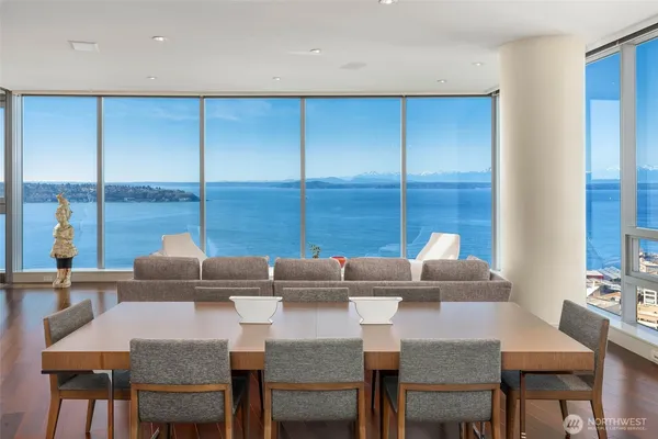 a view of a dining room with furniture and window