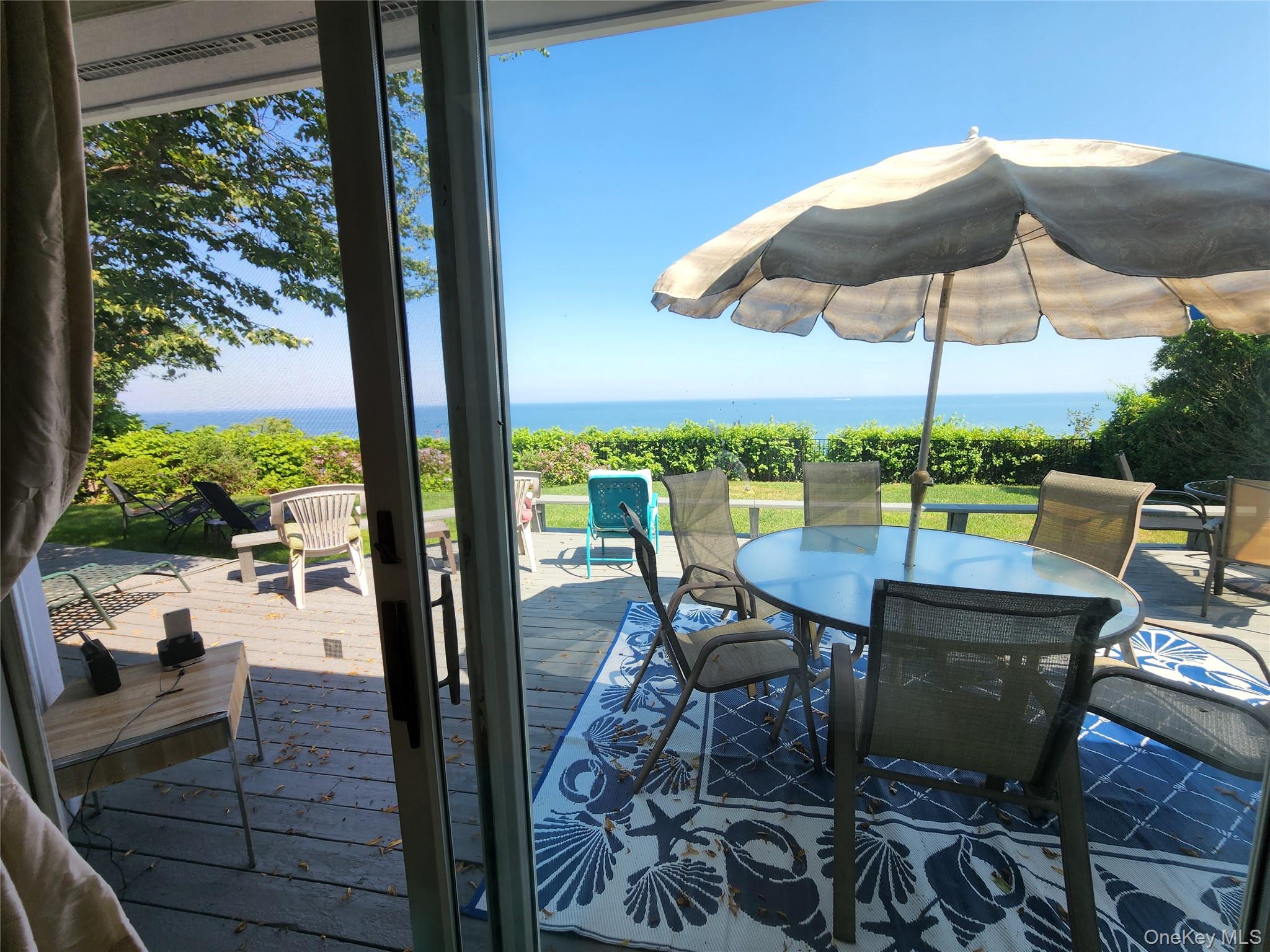 7 Riverhead Road Sound Beach, NY 11789 - Photo 5 of 33 view through sliding glass doors