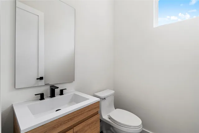 a bathroom with a sink and a toilet