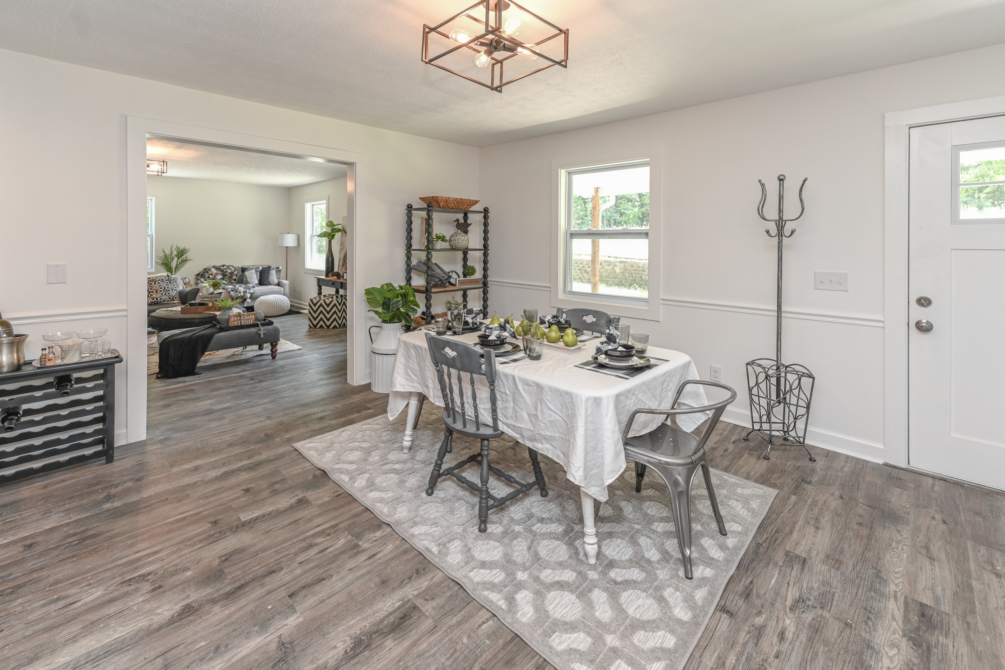 665 Hog Back Ridge Road Bethpage, TN 37022 - Photo 36 of 66 a view of a dining room with furniture window and wooden floor