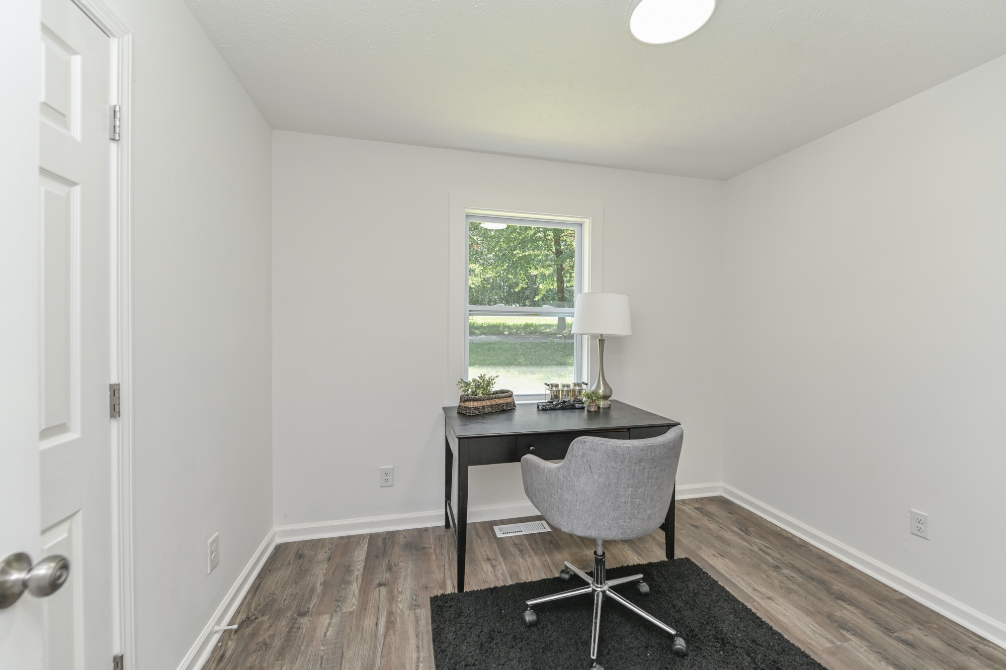 665 Hog Back Ridge Road Bethpage, TN 37022 - Photo 49 of 66 a view of a workspace with furniture and wooden floor