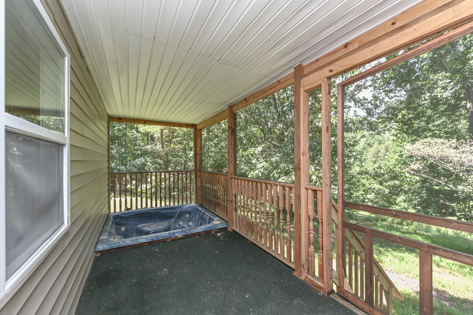 665 Hog Back Ridge Road Bethpage, TN 37022 - Photo 58 of 66 a view of a room with wooden floor and outdoor space