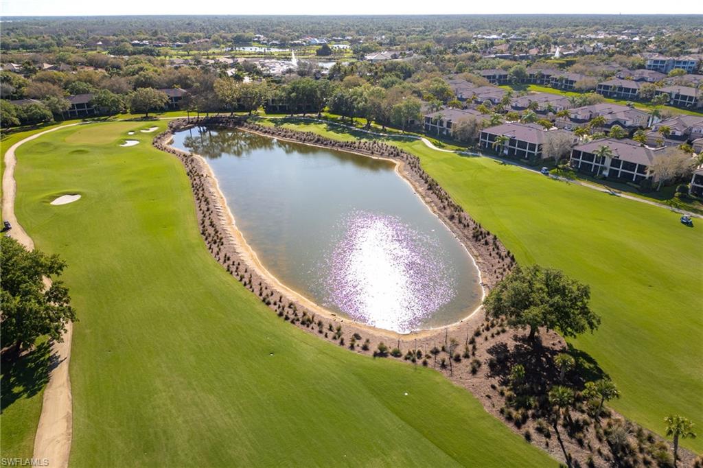 982 Fountain Run Naples, FL 34119 - Photo 43 of 44 Drone / aerial view of a large body of water and a golf club