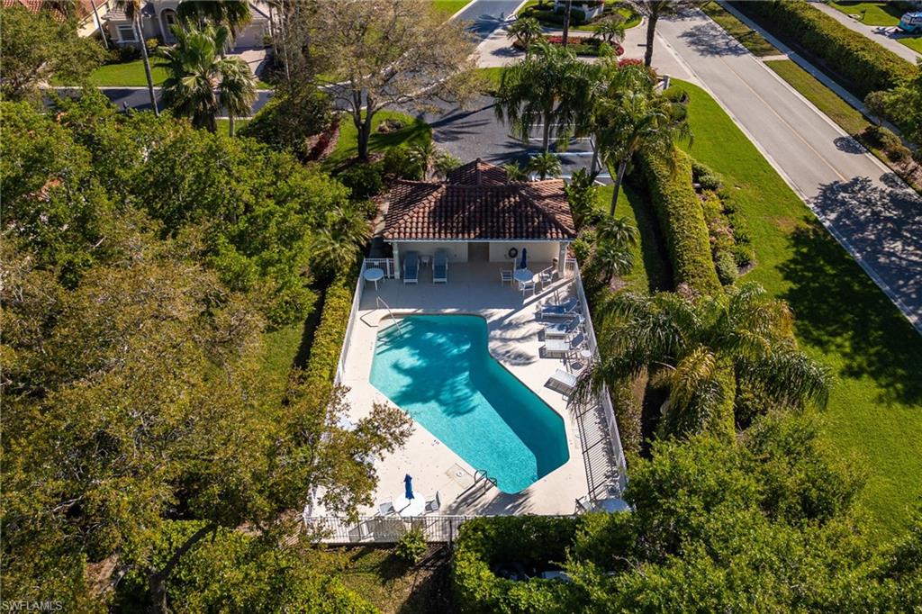 982 Fountain Run Naples, FL 34119 - Photo 44 of 44 Drone / aerial view of a pool area