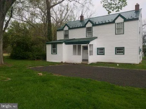 a kitchen with a stove and a microwave