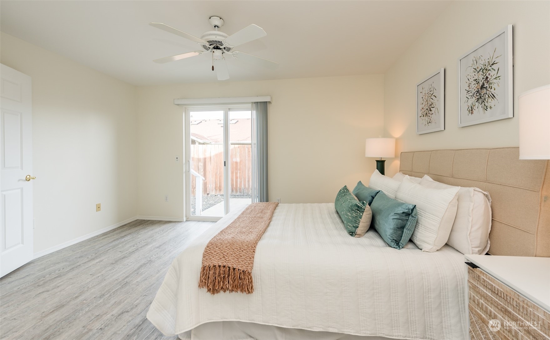 818 East Washington Place Sequim, WA 98382 - Photo 13 of 28 a bedroom with a bed and a window