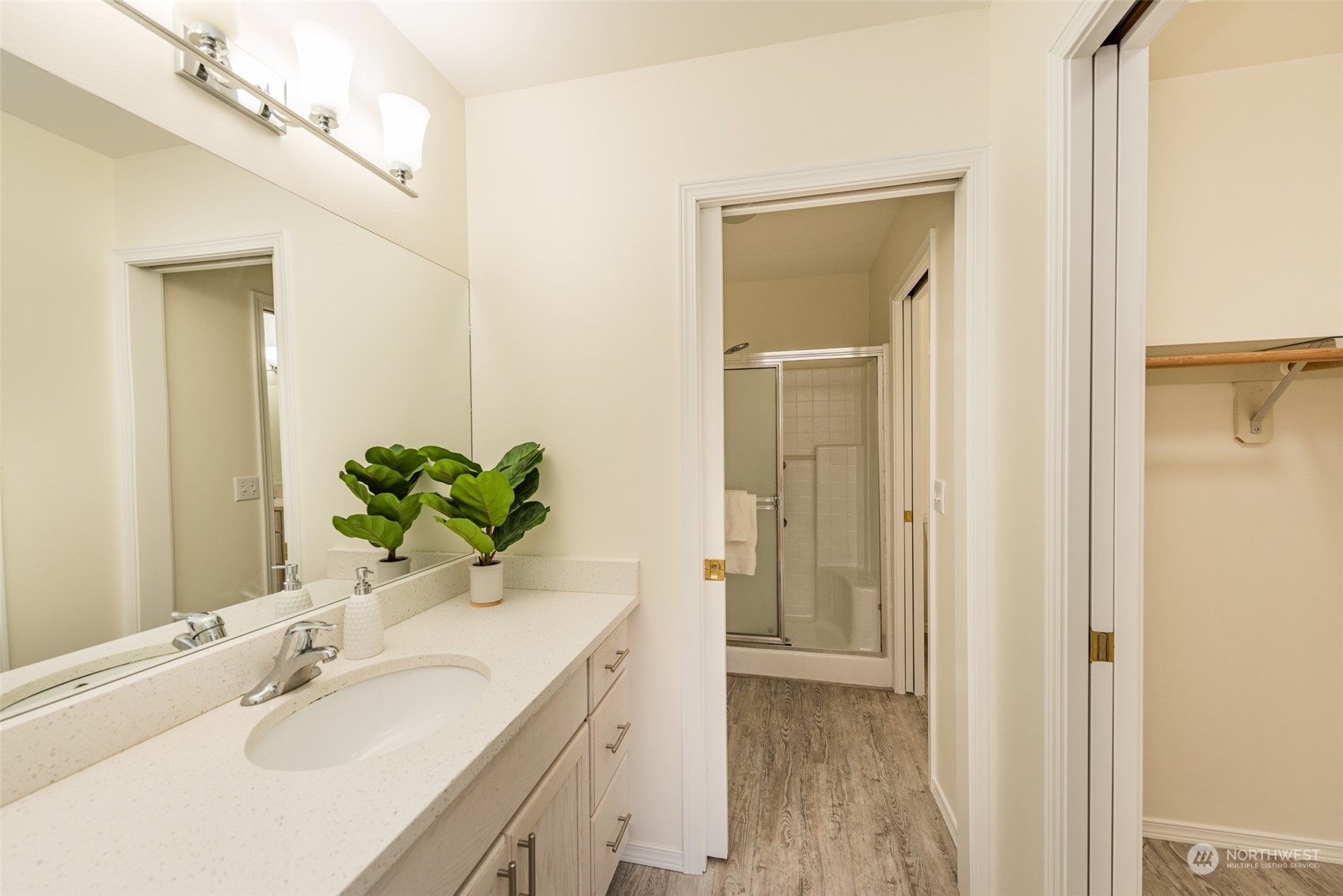 818 East Washington Place Sequim, WA 98382 - Photo 15 of 28 a bathroom with a sink a vanity and a mirror