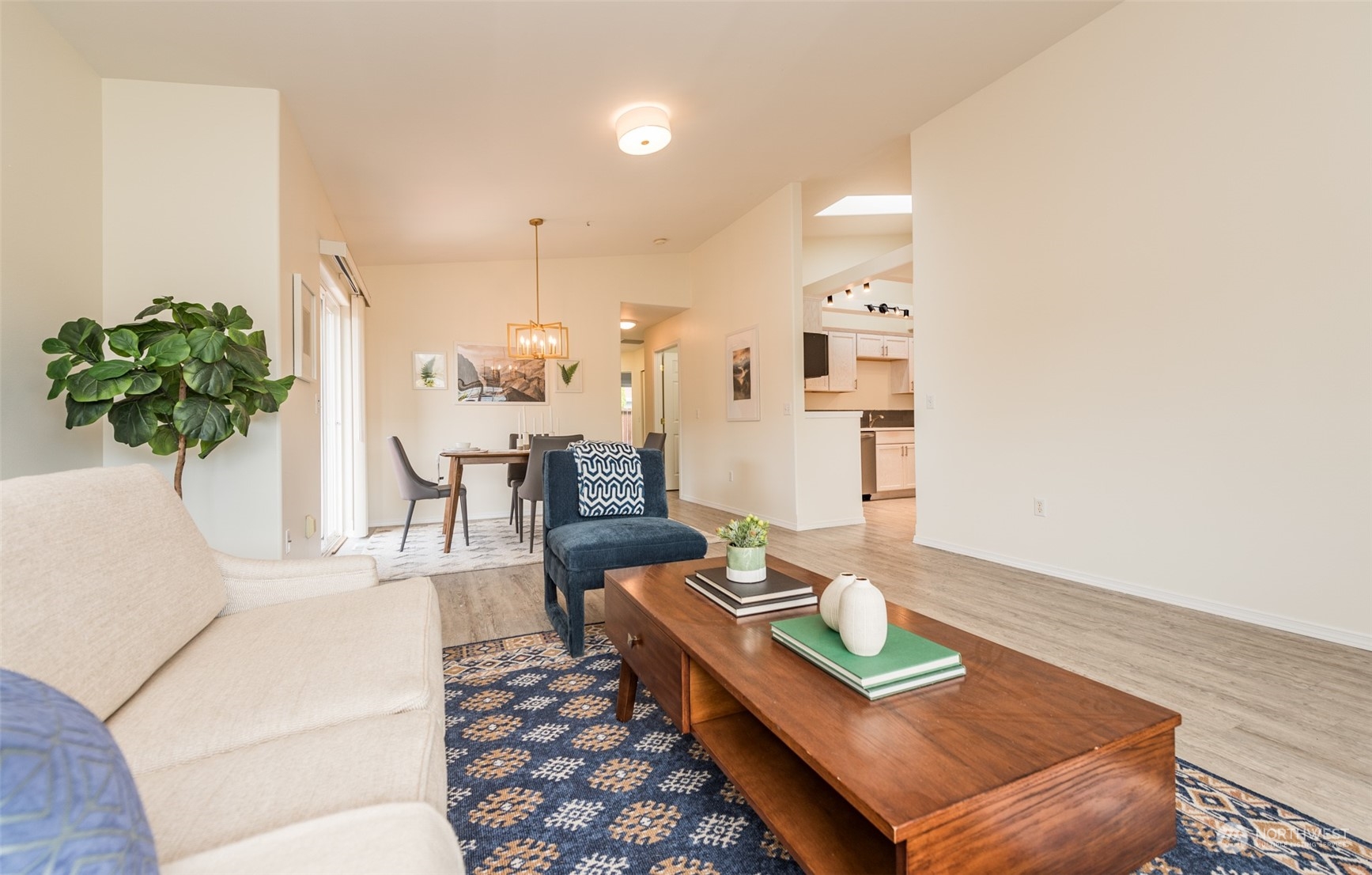 818 East Washington Place Sequim, WA 98382 - Photo 7 of 28 a living room with furniture and a potted plant