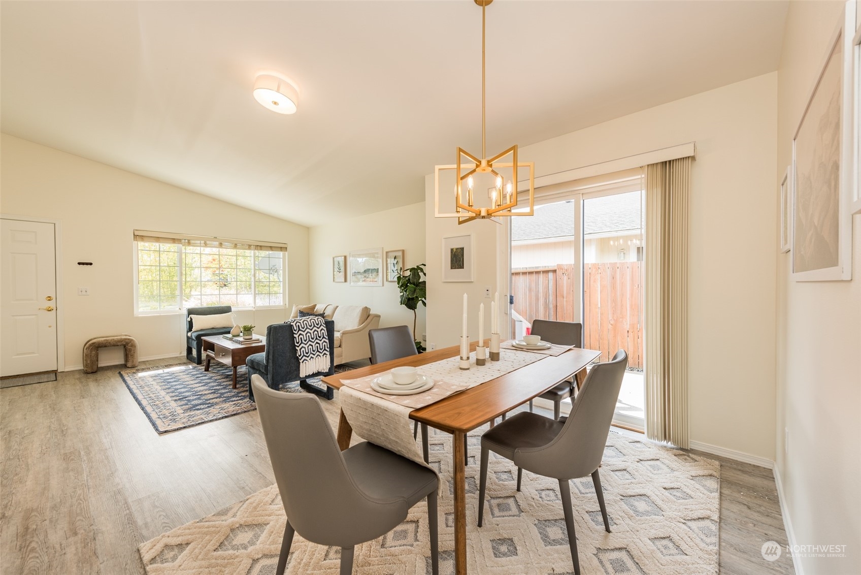 818 East Washington Place Sequim, WA 98382 - Photo 8 of 28 a view of a dining room with furniture and window