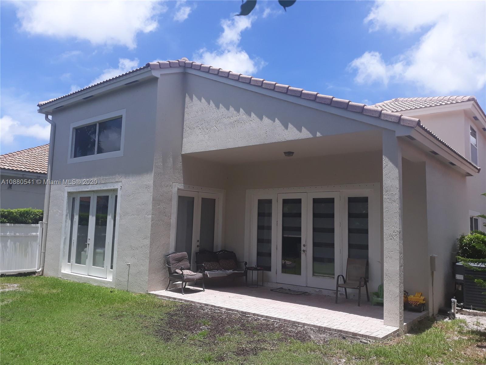 6466 Brava Way Boca Raton, FL 33433 - Photo 50 of 50 a front view of a house with a yard