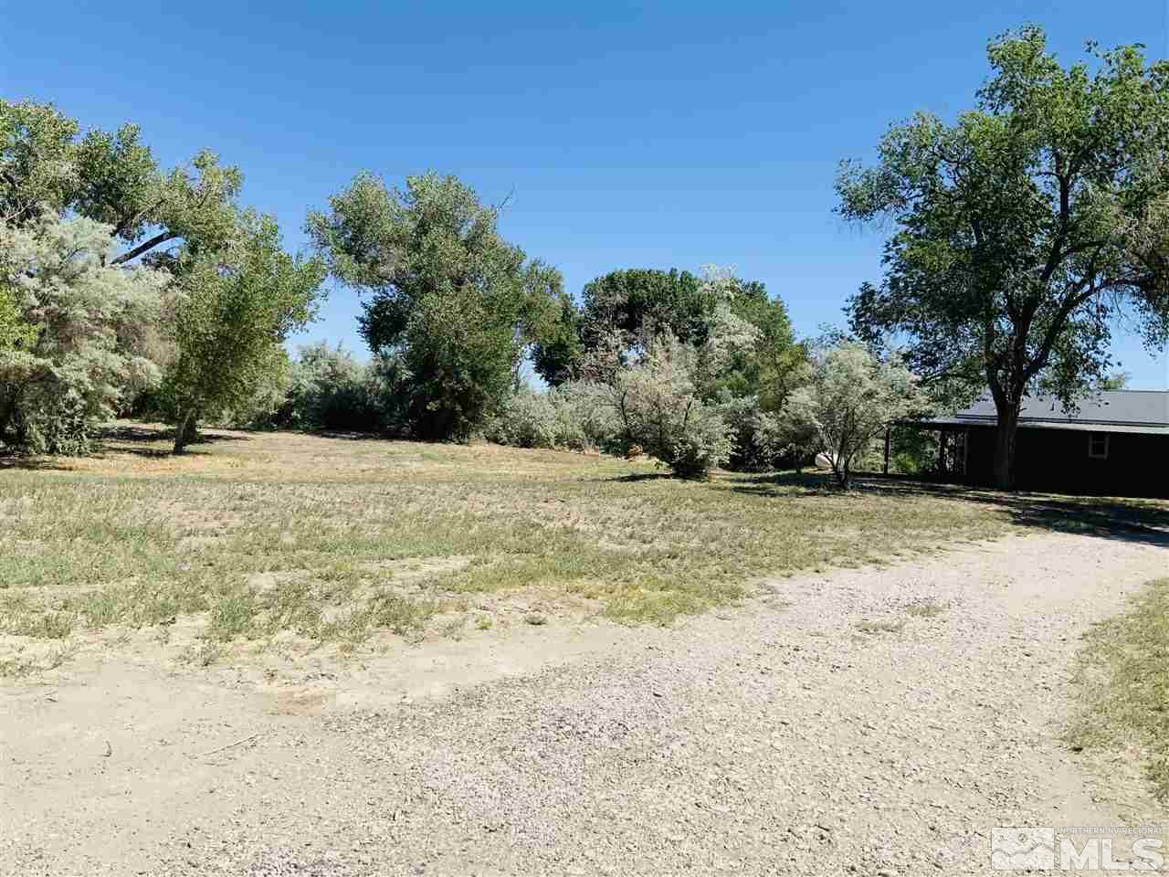 3830 Alcorn Road, Unit RD Fallon, NV 89406 - Photo 4 of 20 a view of a yard with a house