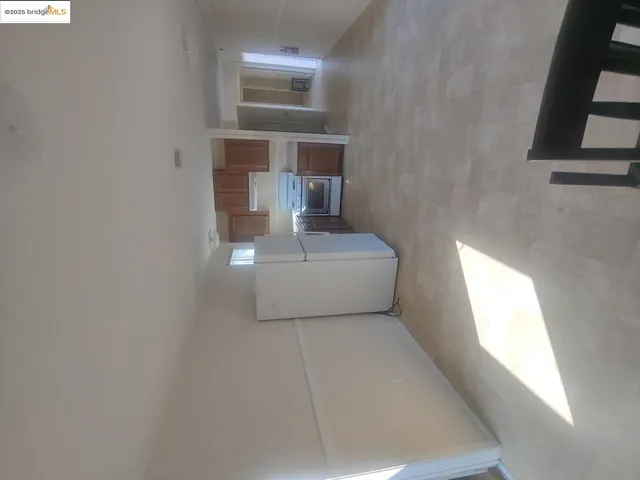 a room that has a bed and a chair in it