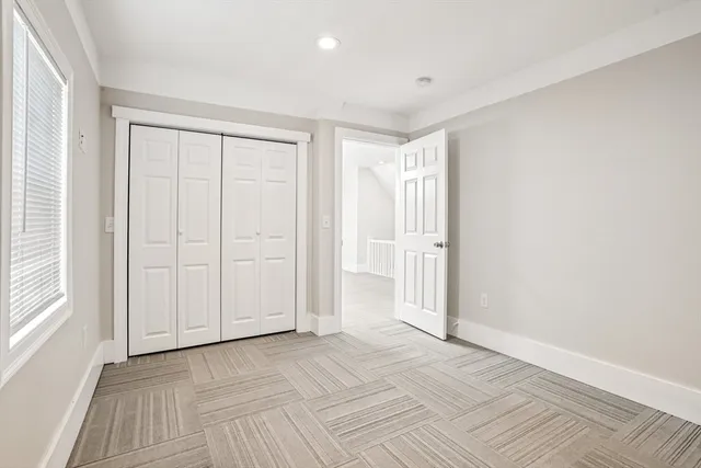 a view of a livingroom with stairs