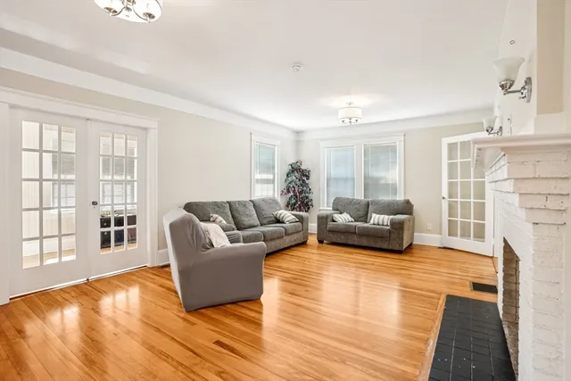 a living room with furniture and a table