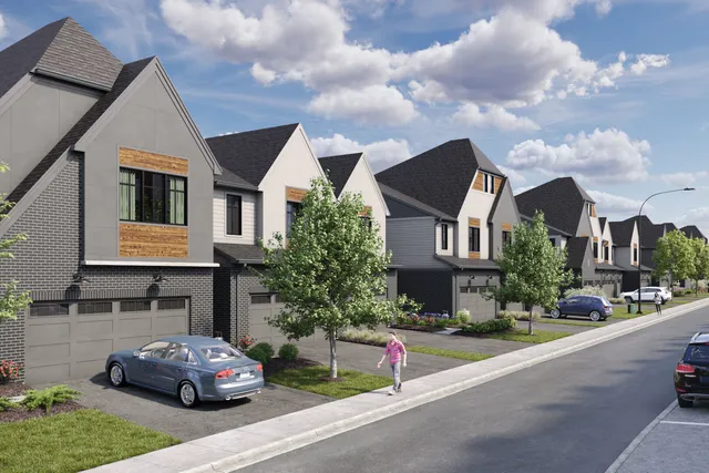 a car parked in front of a brick house
