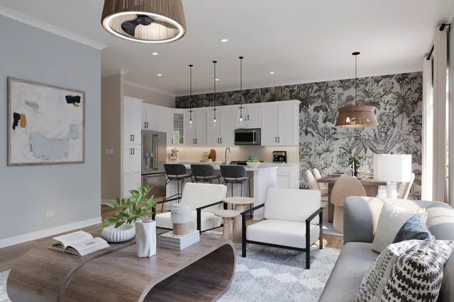 a living room with furniture kitchen view and a chandelier