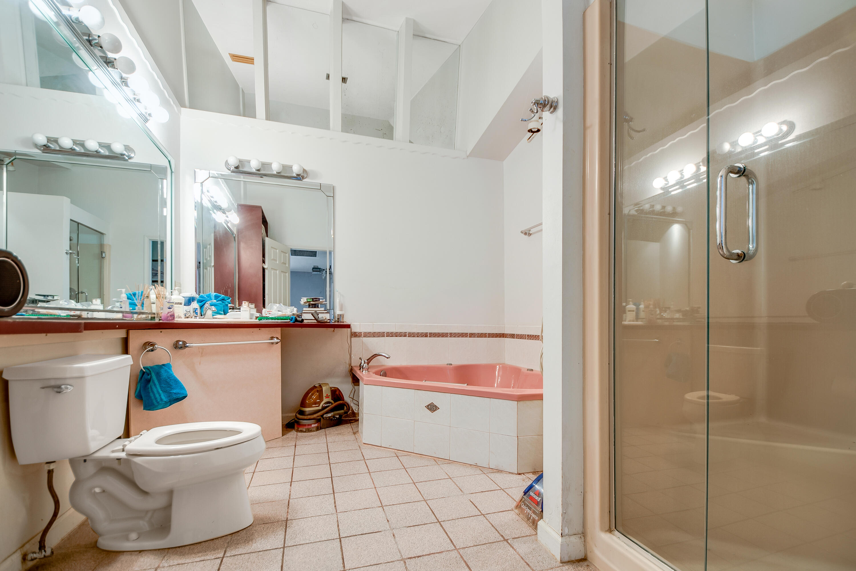 11 Capri Boulevard Naples, FL 34113 - Photo 15 of 39 a bathroom with a sink toilet and shower