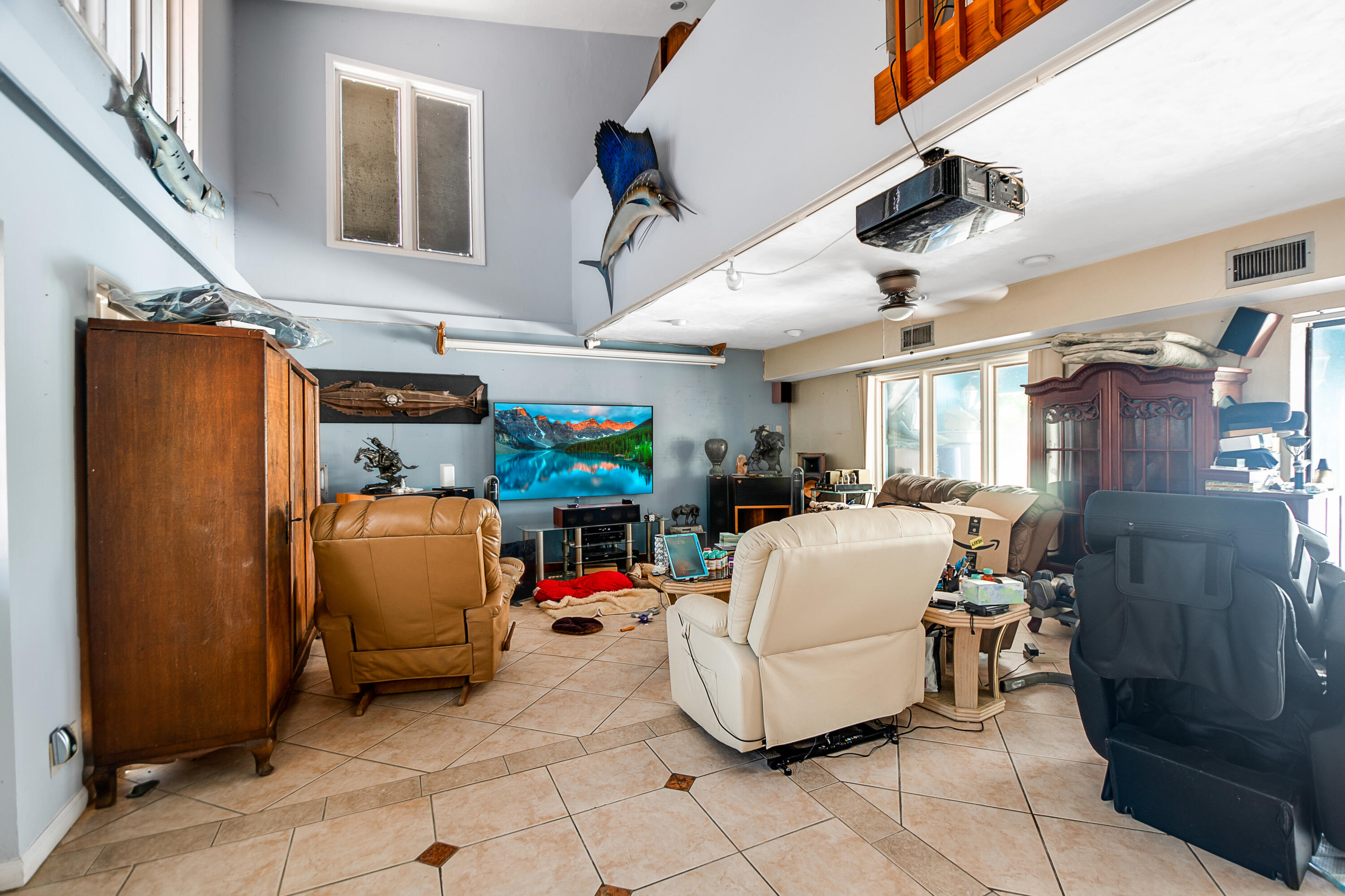 11 Capri Boulevard Naples, FL 34113 - Photo 20 of 39 a living room with furniture and a window