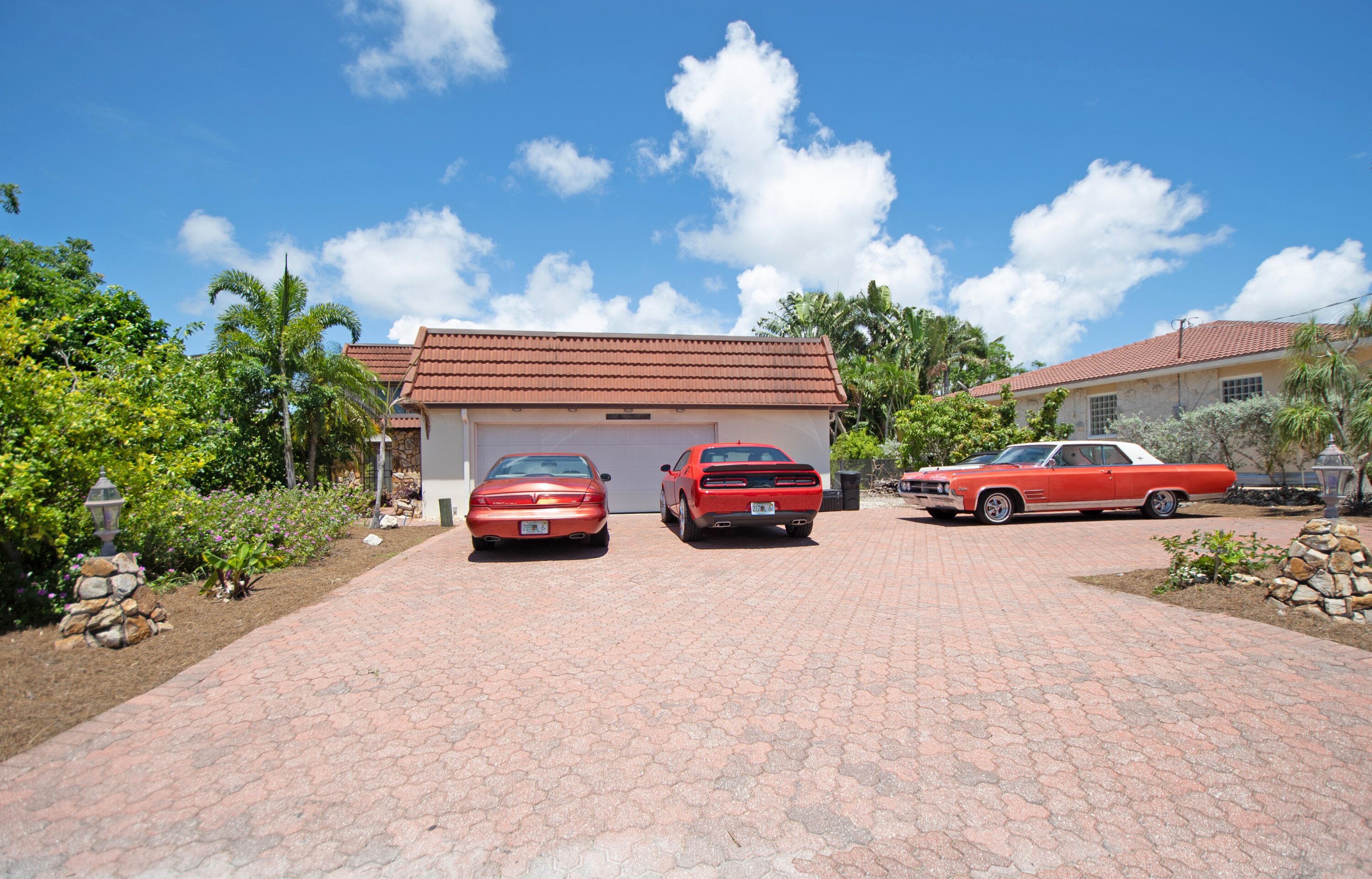 11 Capri Boulevard Naples, FL 34113 - Photo 2 of 39 a car parked in front of a house