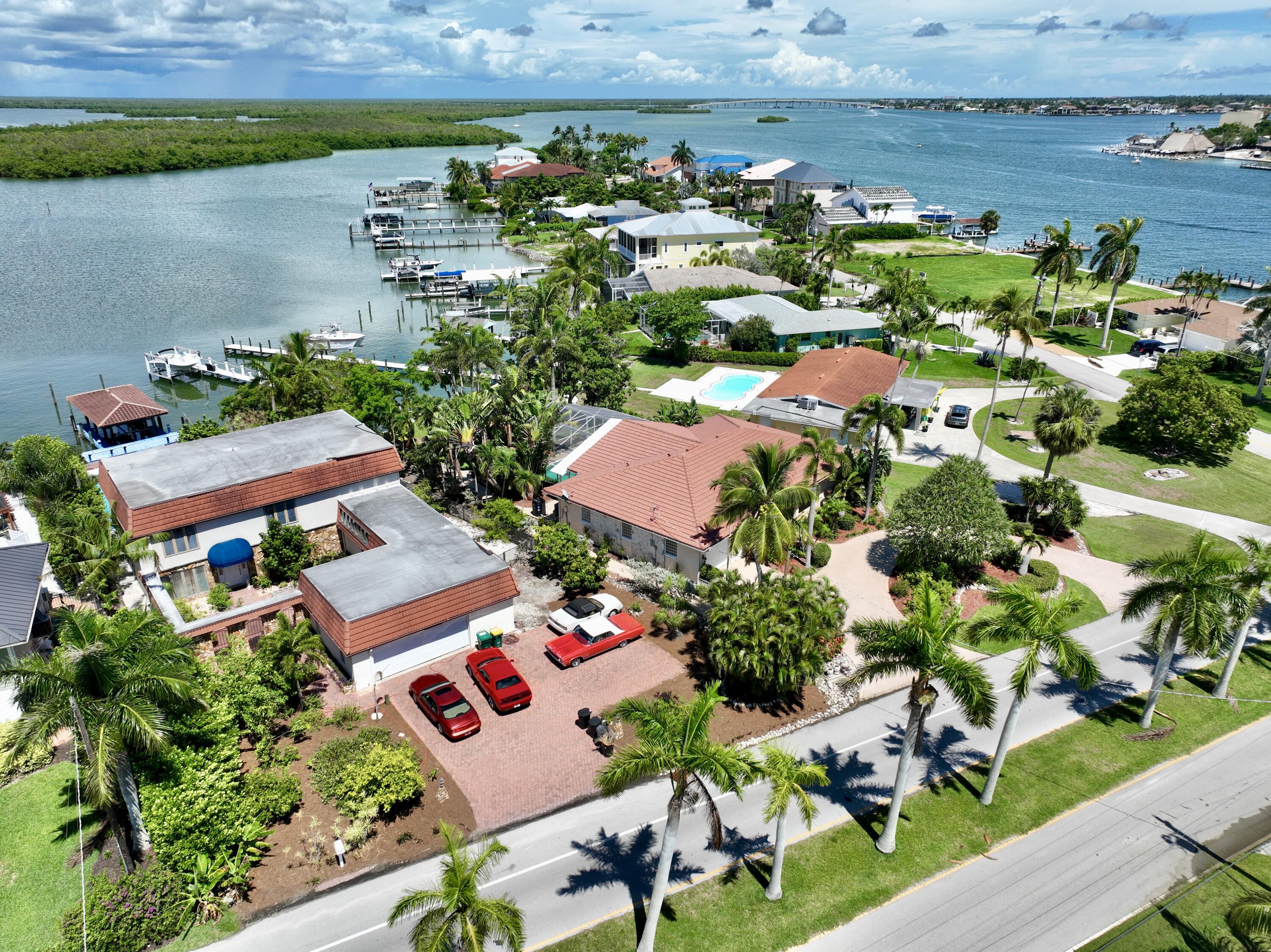 11 Capri Boulevard Naples, FL 34113 - Photo 30 of 39 an aerial view of a house with a garden