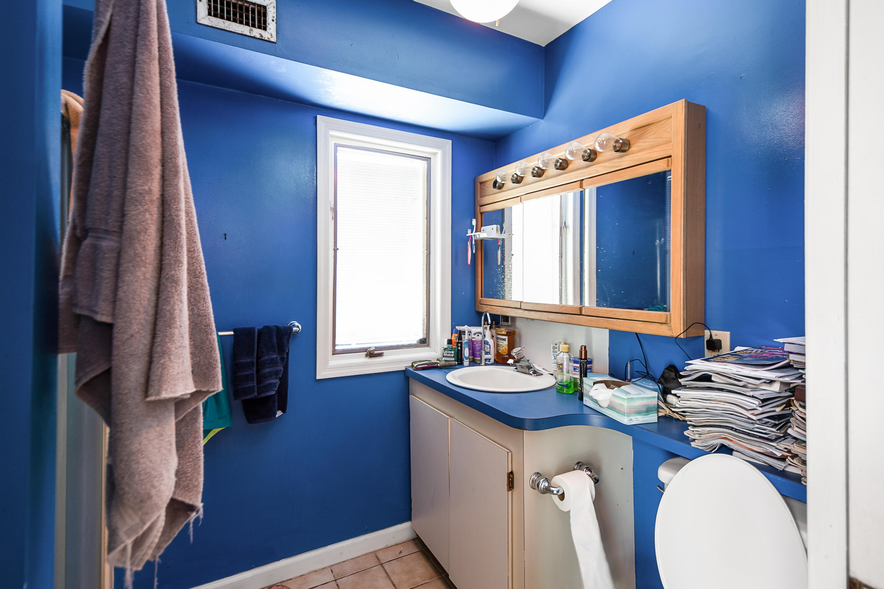 11 Capri Boulevard Naples, FL 34113 - Photo 10 of 39 a bathroom with a double vanity sink and a mirror