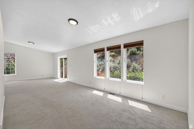 380 Luzern Road Midway, UT 84049 - Photo 18 of 74 Spacious interior with neutral carpeting and light-toned walls