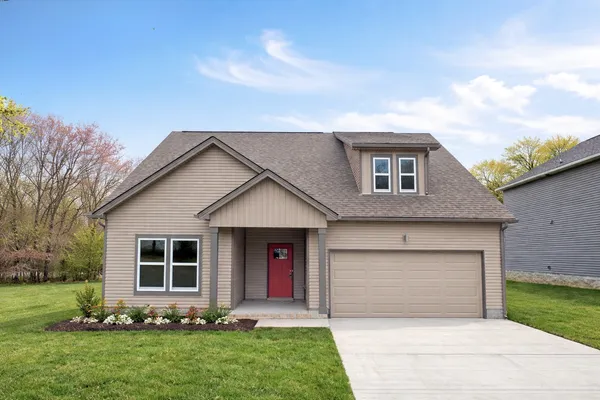 a front view of house with yard