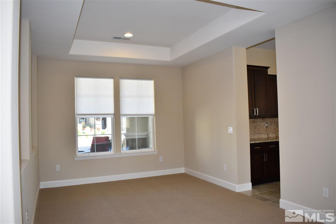 9885 Sea Breeze Lane Reno, NV 89521 - Photo 12 of 25 an empty room with windows and closet