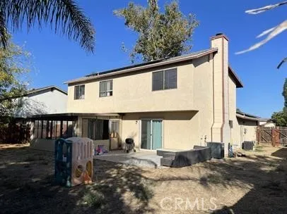 a view of a house with a patio